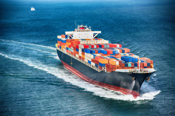 generic-cargo-container-ship-at-sea-picture-id591986620